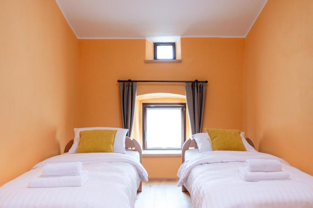 Postel nebo postele na pokoji v ubytování Wellba Homestead Planina