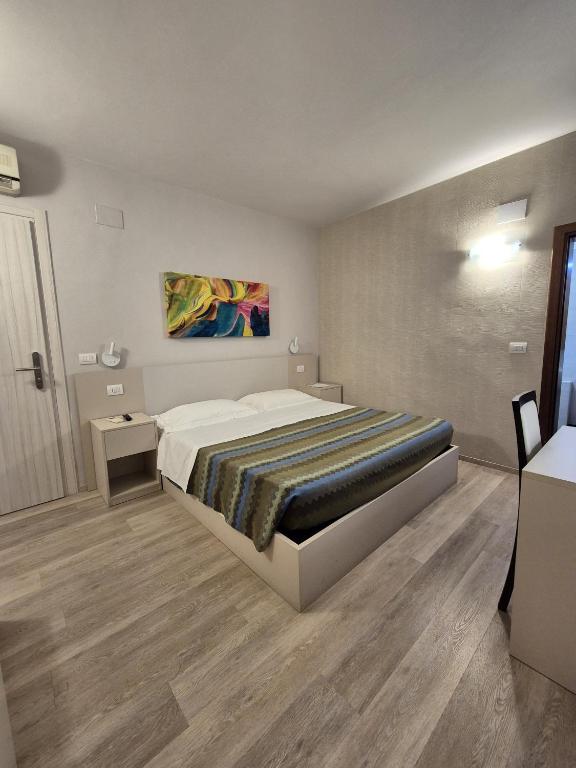 Postel nebo postele na pokoji v ubytování Hotel Bellavista