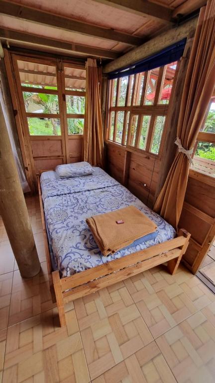 Postel nebo postele na pokoji v ubytování PANCHIGUA HOSTEL
