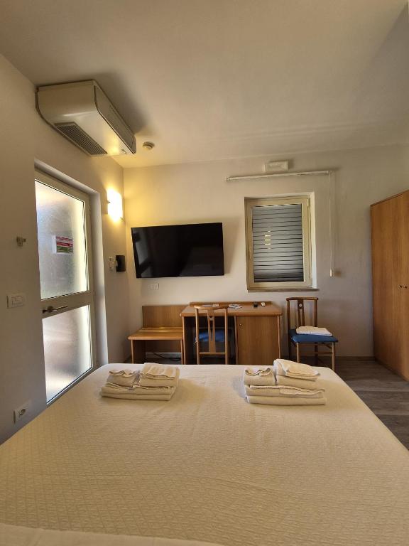 TV a/nebo společenská místnost v ubytování Hotel Bellavista
