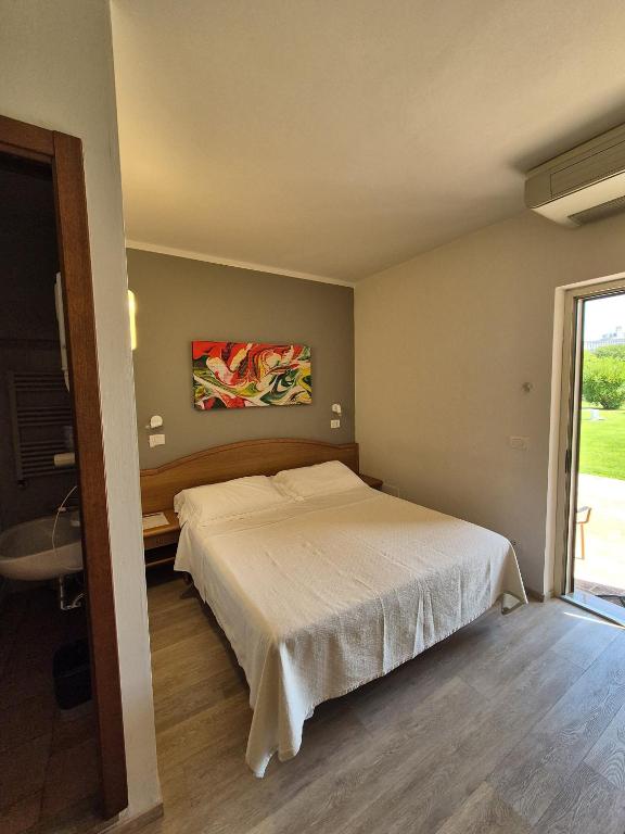 Postel nebo postele na pokoji v ubytování Hotel Bellavista
