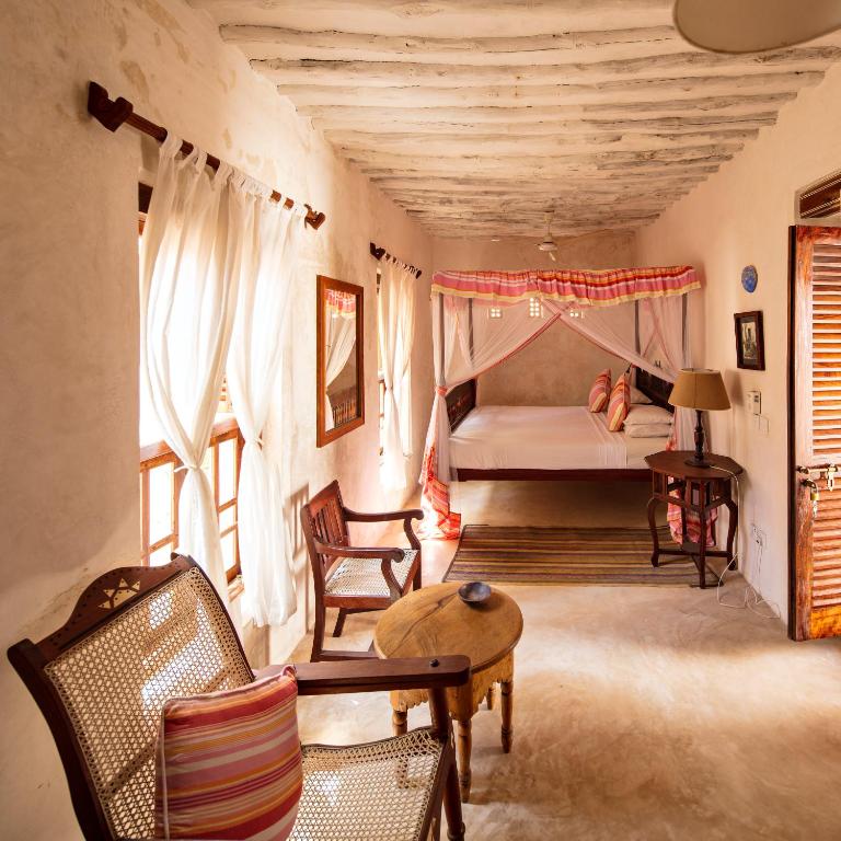 Voodi või voodid majutusasutuse Authentic Swahili style villa Milele House toas