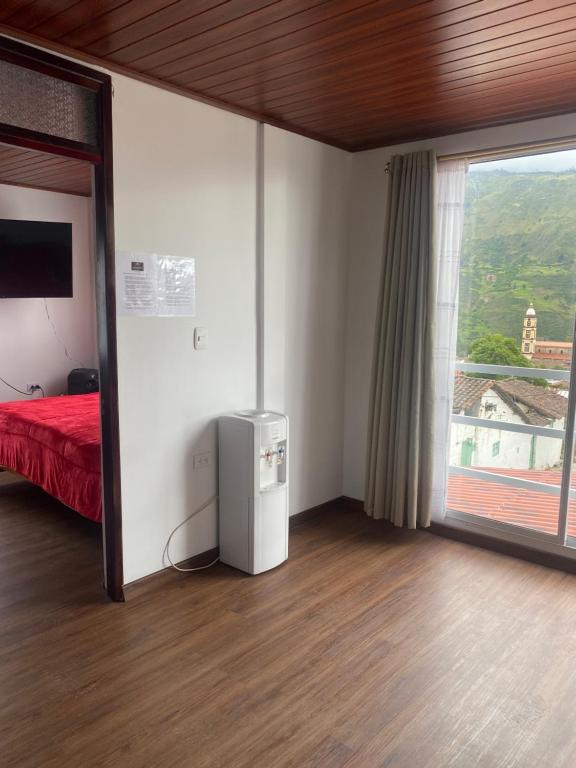 Postel nebo postele na pokoji v ubytování GLL HOTEL