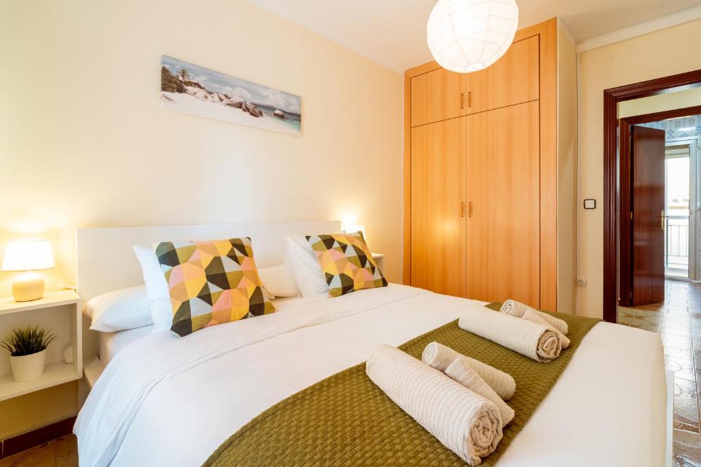 Posteľ alebo postele v izbe v ubytovaní Sea Life Salou Apartment