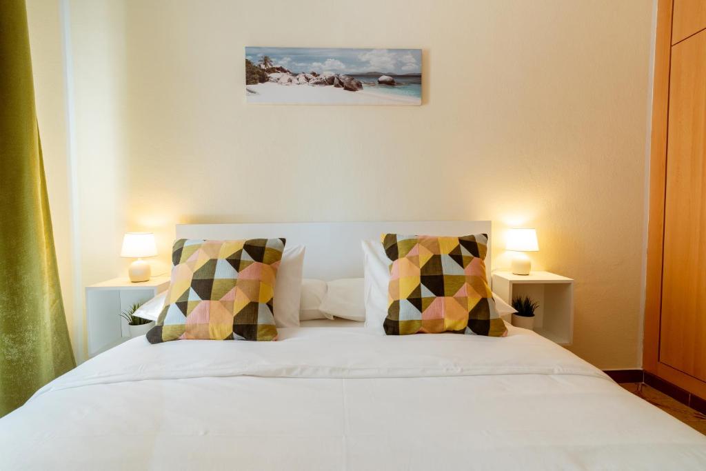 Posteľ alebo postele v izbe v ubytovaní Sea Life Salou Apartment