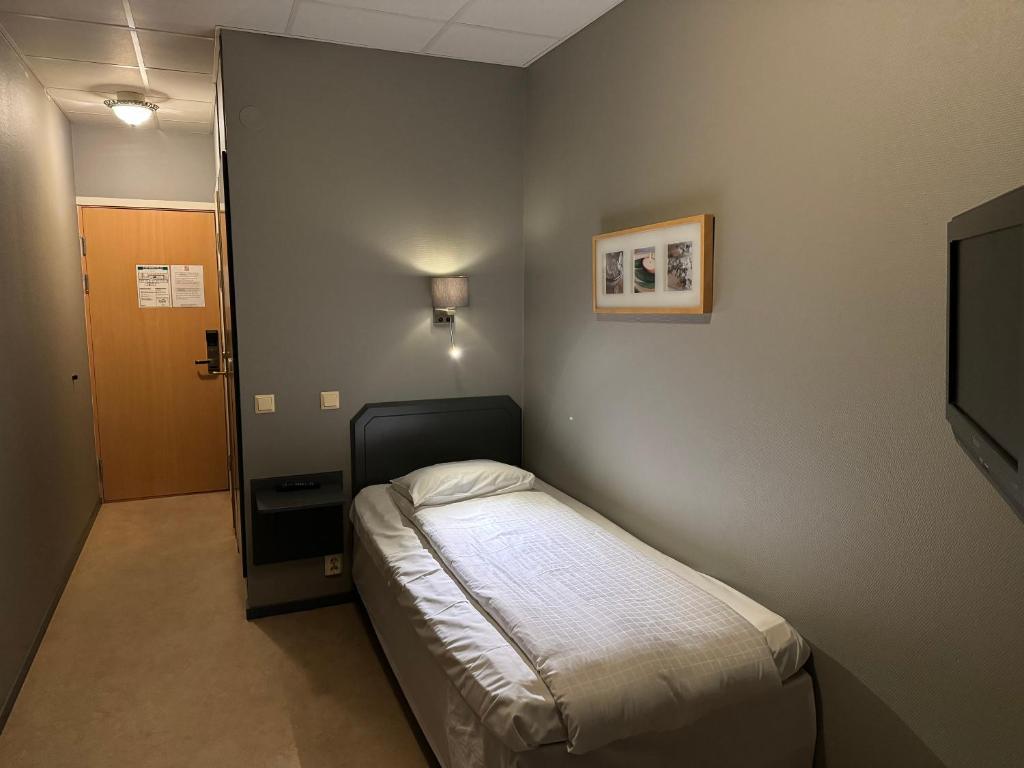 Postel nebo postele na pokoji v ubytování Hotel Expo Stockholm