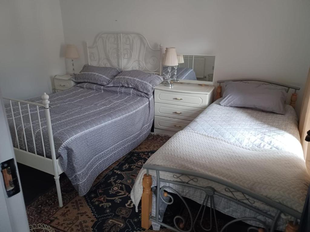 Postel nebo postele na pokoji v ubytování Fadó
