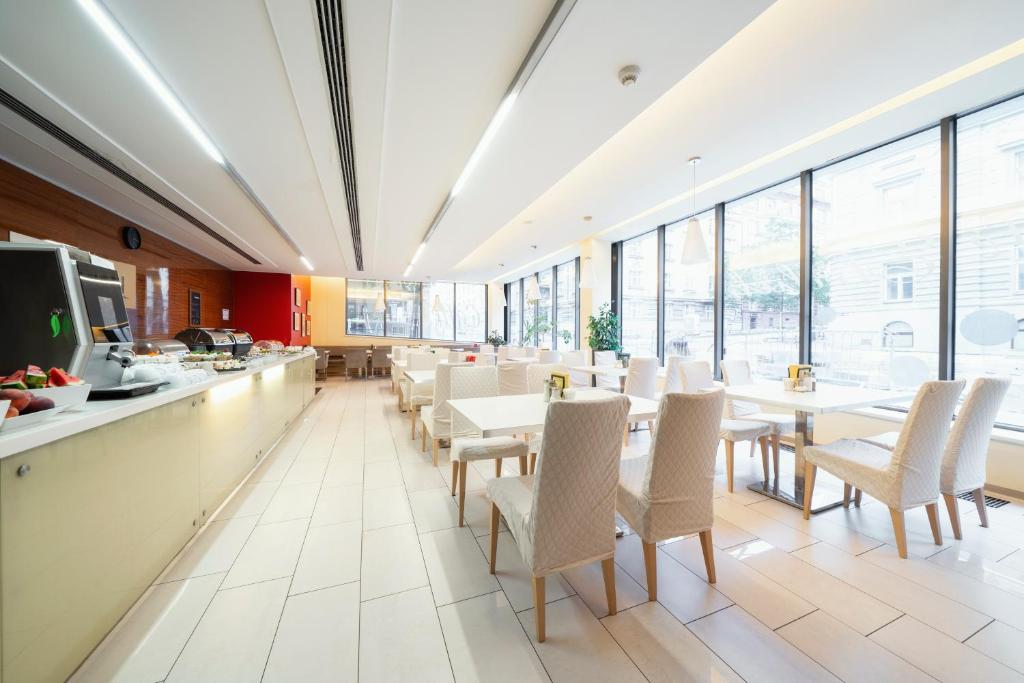 TV a/nebo společenská místnost v ubytování Hotel Ehrlich Prague