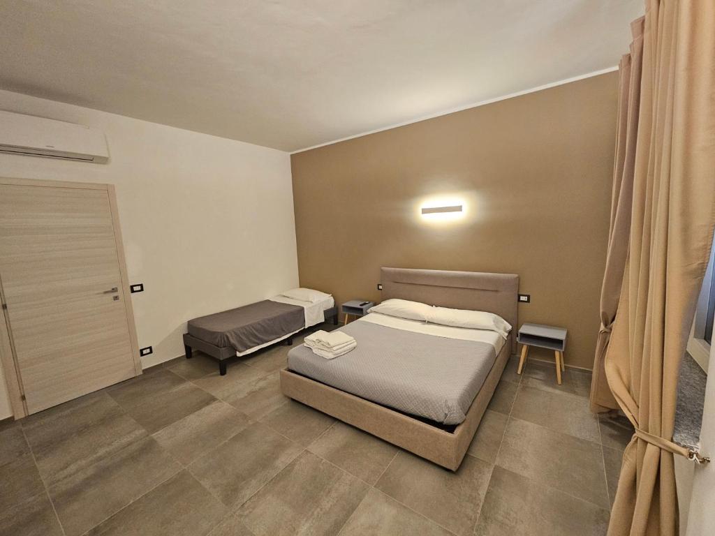 Postel nebo postele na pokoji v ubytování La Casa in Rivalta