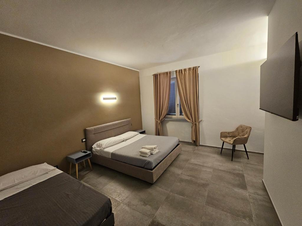 Postel nebo postele na pokoji v ubytování La Casa in Rivalta