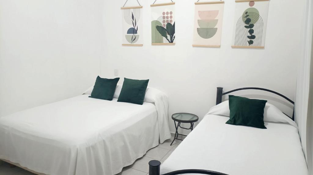 Letto o letti in una camera di Tauch Cancún Centro