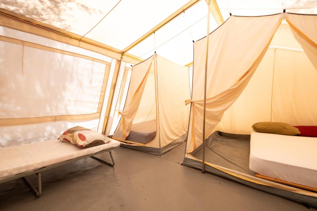 Postel nebo postele na pokoji v ubytování Camping Chania