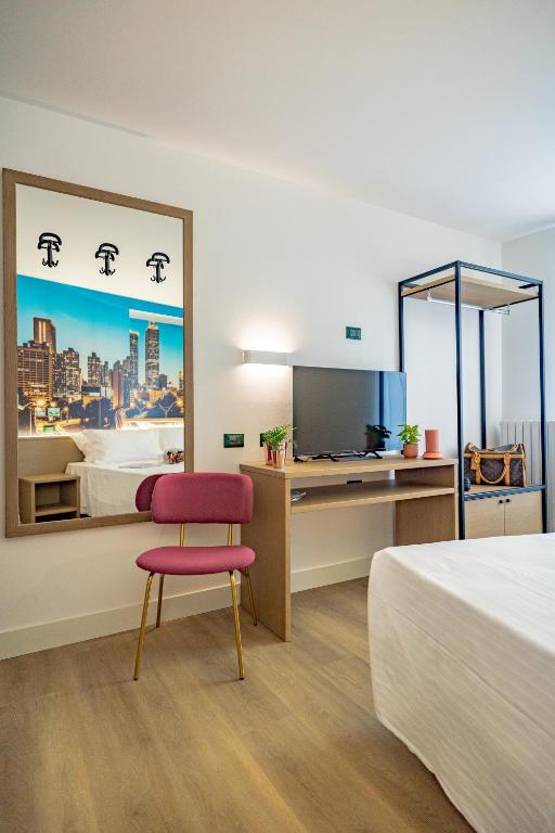 TV a/nebo společenská místnost v ubytování Hotel Ristorante Val America