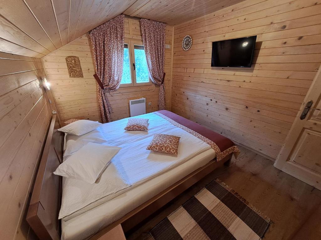 Postel nebo postele na pokoji v ubytování Nagy Lak