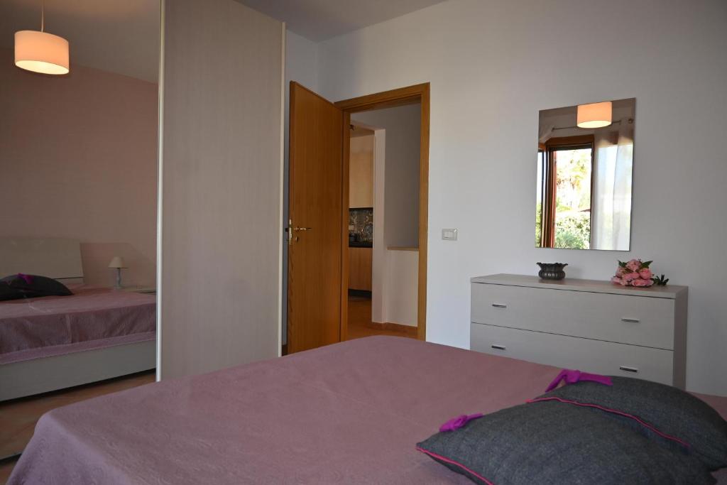 Posteľ alebo postele v izbe v ubytovaní Chalet Calarossa