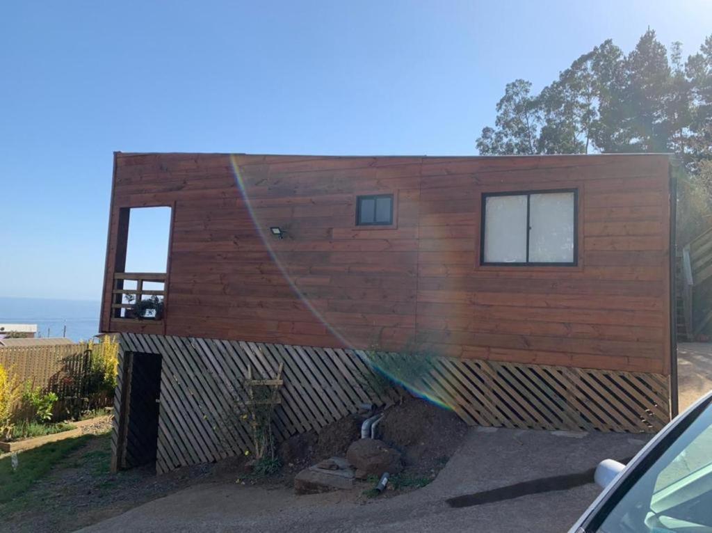 a house being built with a hose at Arriendo Diario Casa en la Playa Pelluhue Maule Chile in Pelluhue