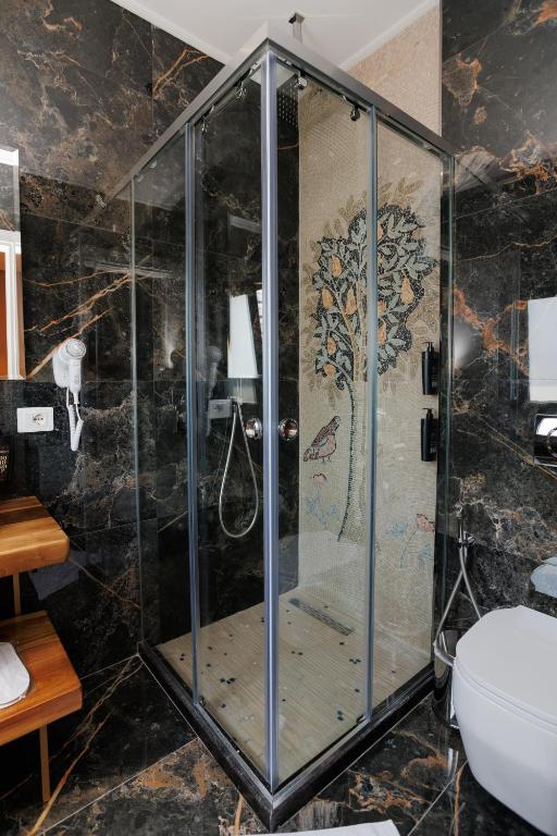 Koupelna v ubytování Harmony Boutique Hotel