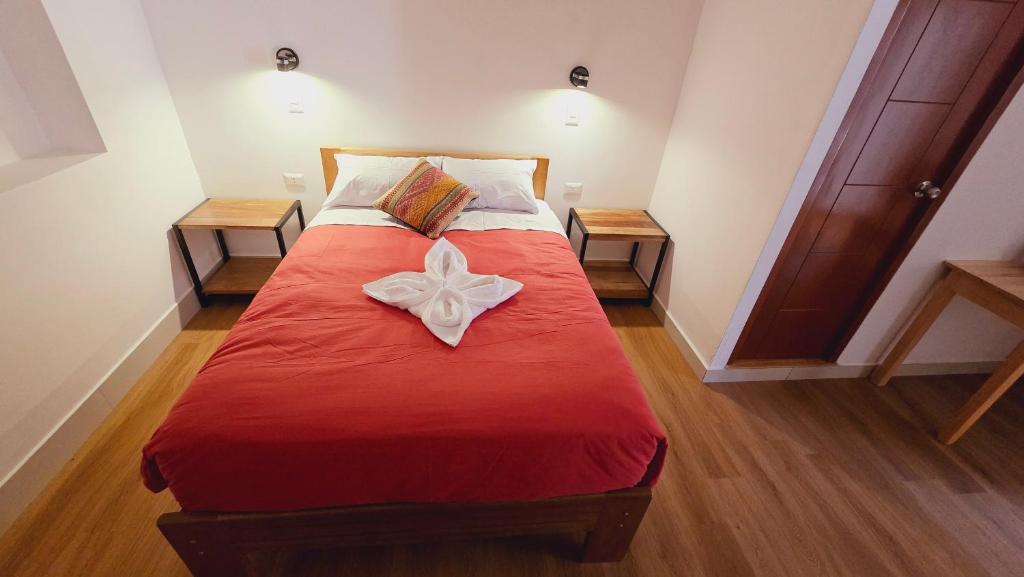 Postel nebo postele na pokoji v ubytování Andes House Cusco