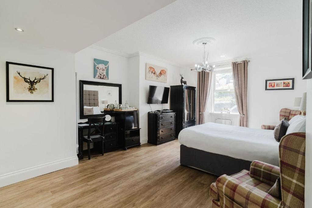 Кровать или кровати в номере The Roxburgh Guest Accommodation