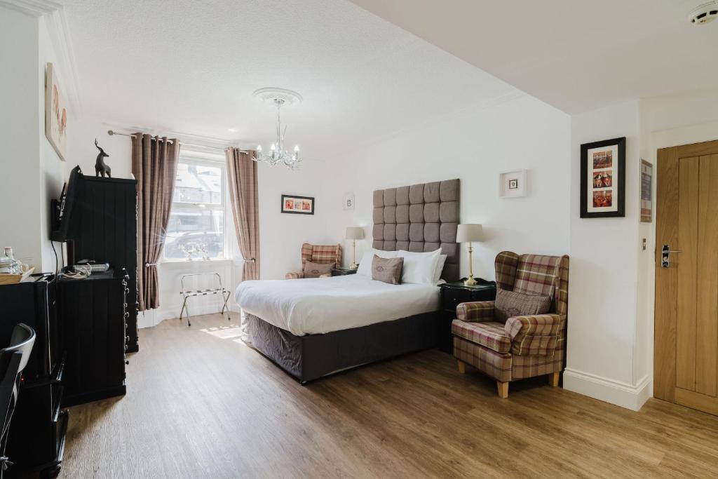 Кровать или кровати в номере The Roxburgh Guest Accommodation
