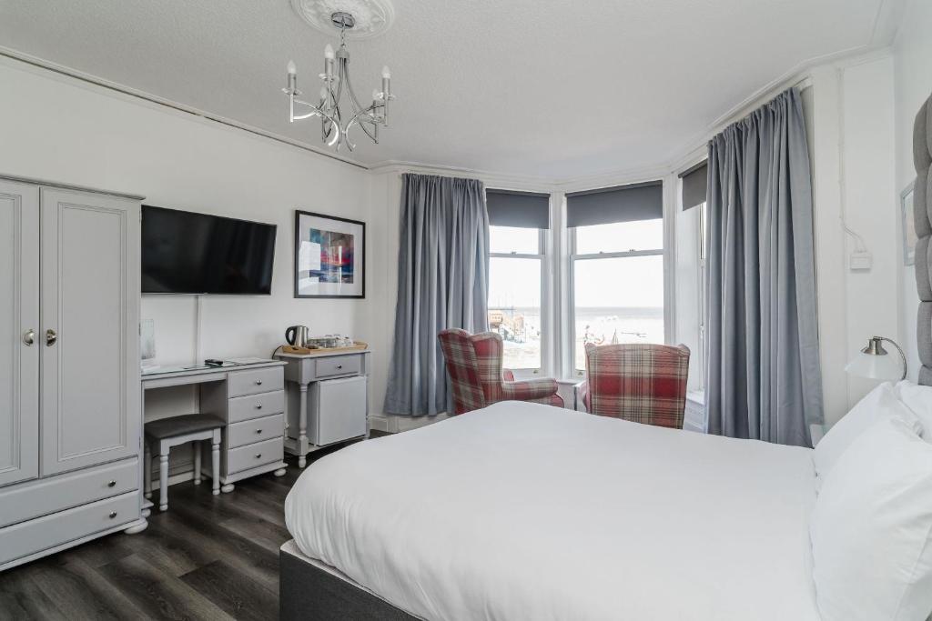 Кровать или кровати в номере The Roxburgh Guest Accommodation