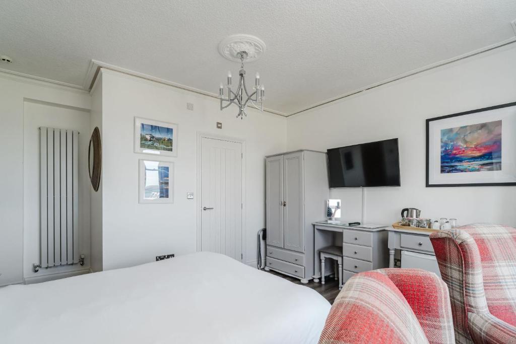 Кровать или кровати в номере The Roxburgh Guest Accommodation