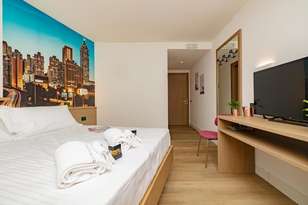 TV a/nebo společenská místnost v ubytování Hotel Ristorante Val America