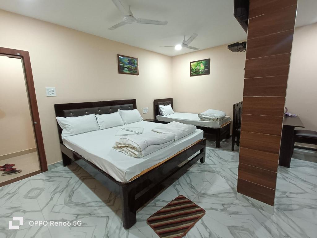 Postel nebo postele na pokoji v ubytování Platinum Lodge