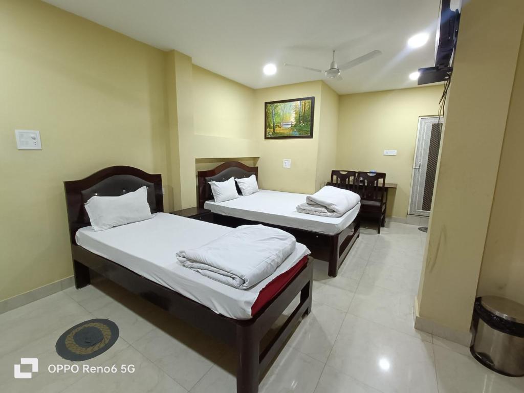 Postel nebo postele na pokoji v ubytování Platinum Lodge