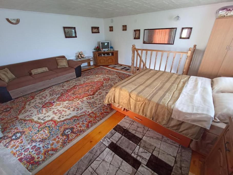 Postel nebo postele na pokoji v ubytování JJ Zavoi