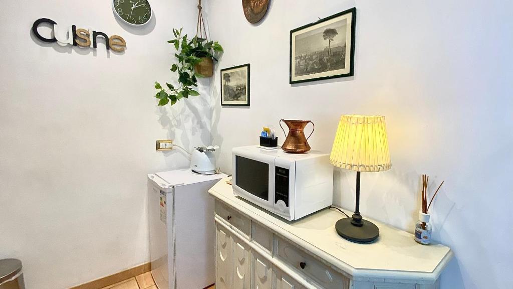 A kitchen or kitchenette at Karma House Deluxe Navona