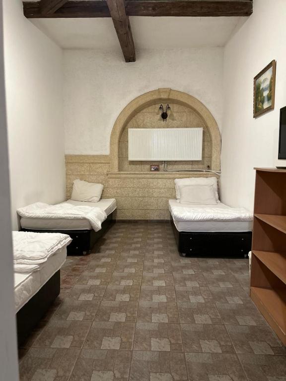 Postel nebo postele na pokoji v ubytování London Hostel