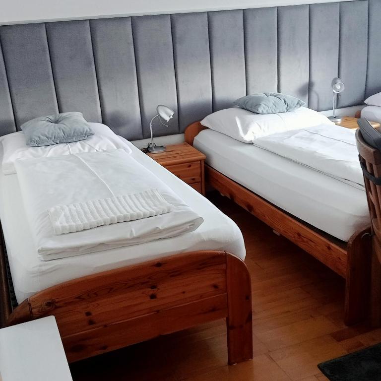 Posteľ alebo postele v izbe v ubytovaní Eliza noclegi