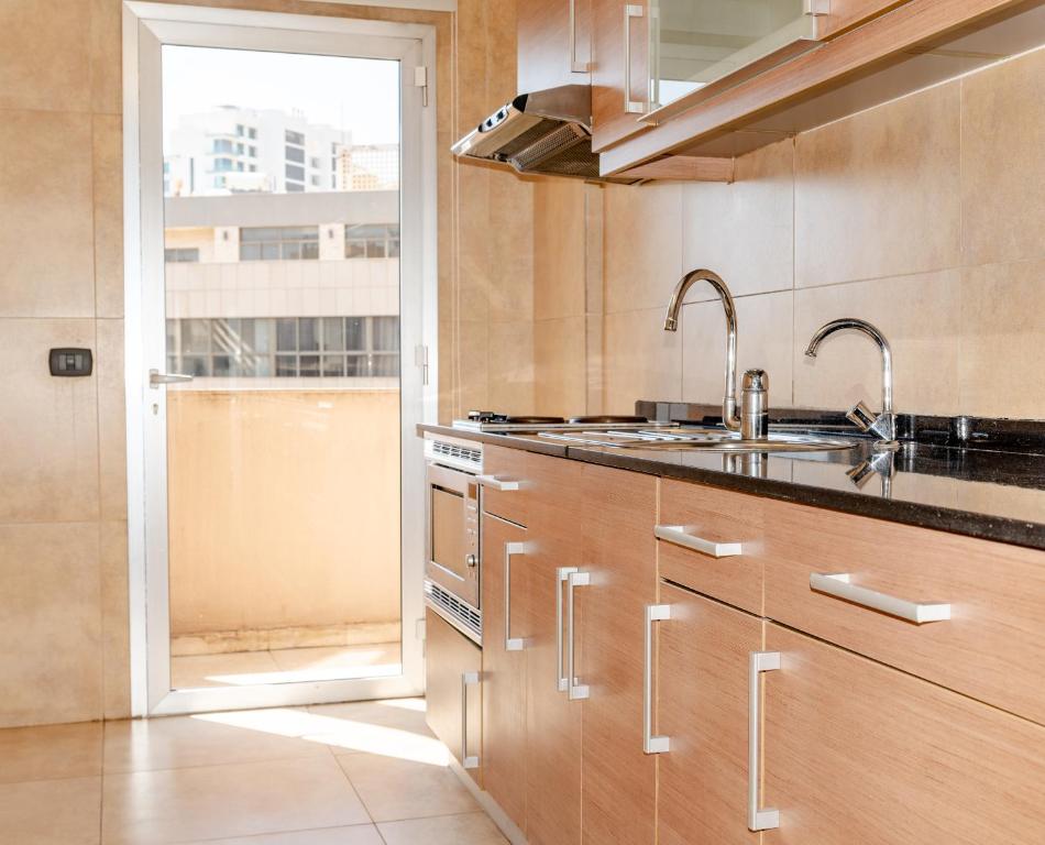 Kuchyň nebo kuchyňský kout v ubytování Britannia Suites