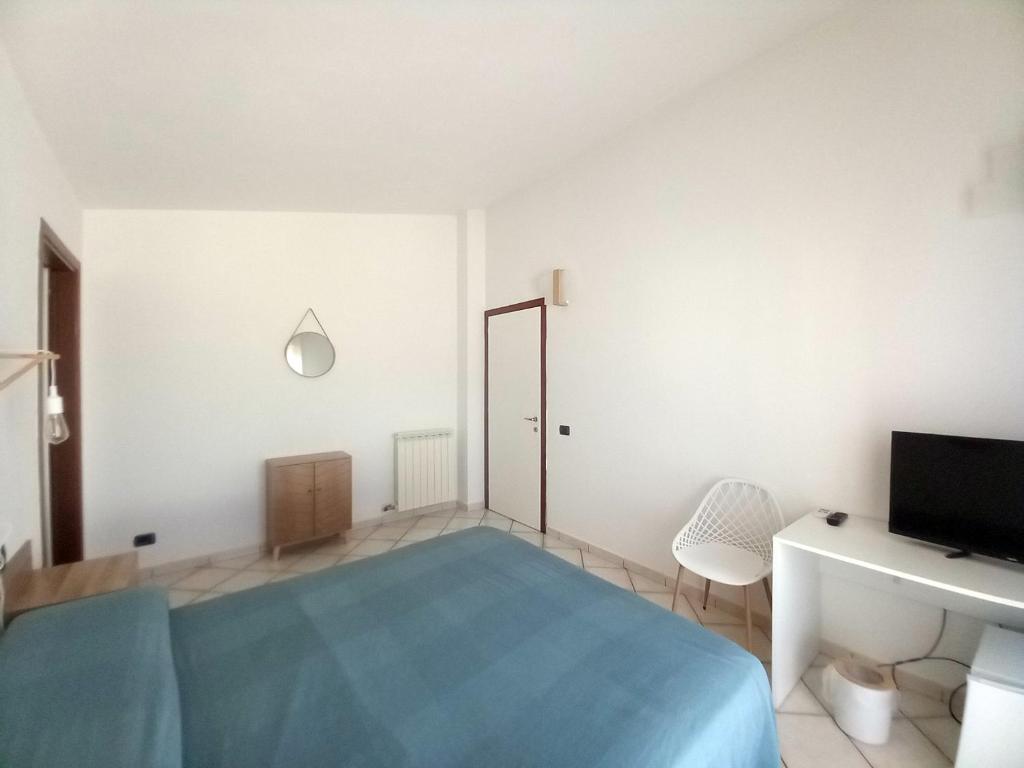 Postel nebo postele na pokoji v ubytování Villa Acquamarina