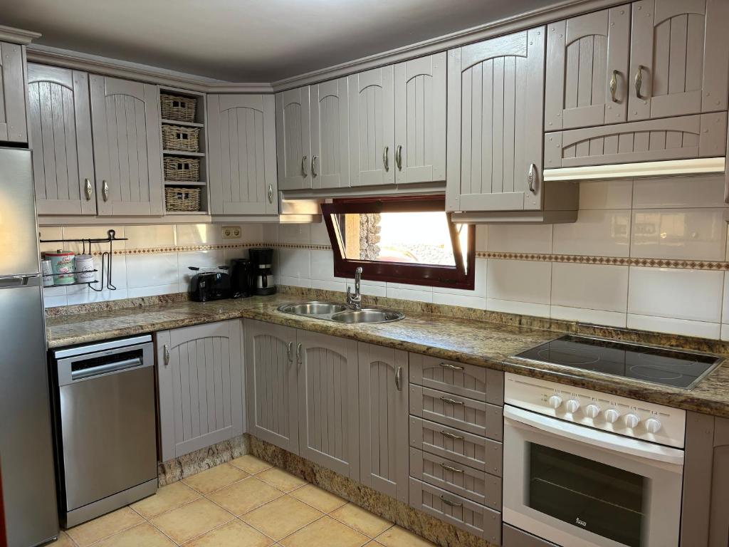 A kitchen or kitchenette at Casa Mía