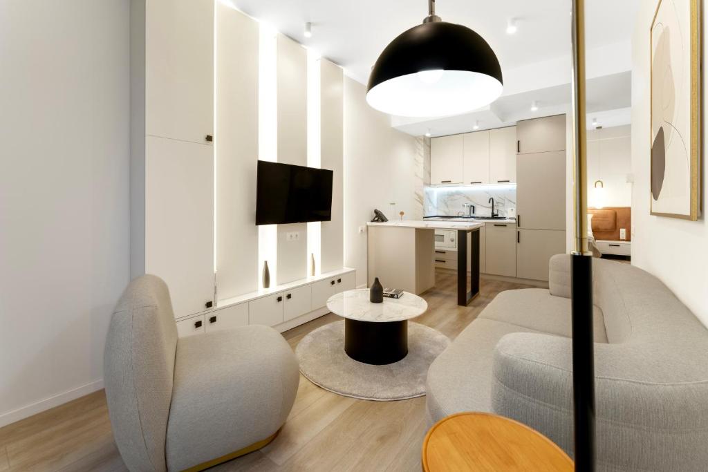 TV a/nebo společenská místnost v ubytování Solridge Aparthotel