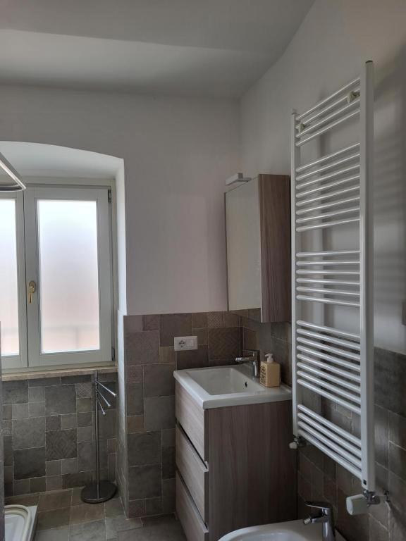 Koupelna v ubytování Magic Spell - 200 mq - zona centro - intera casa vacanze con ampi spazi relax, fino a 10 ospiti