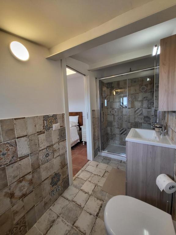 Koupelna v ubytování Magic Spell - 200 mq - zona centro - intera casa vacanze con ampi spazi relax, fino a 10 ospiti