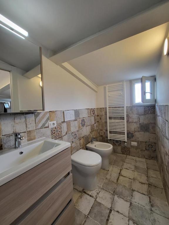 Koupelna v ubytování Magic Spell - 200 mq - zona centro - intera casa vacanze con ampi spazi relax, fino a 10 ospiti