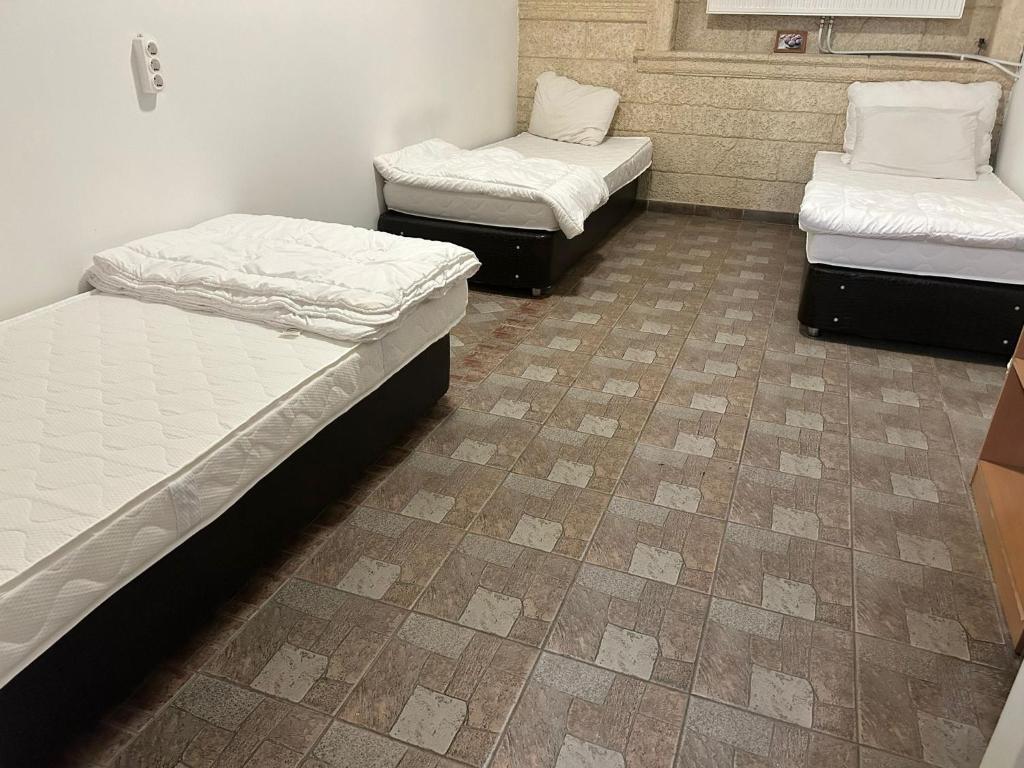Postel nebo postele na pokoji v ubytování London Hostel