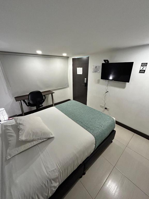 Postel nebo postele na pokoji v ubytování Aw Hotel Serenity Ferial