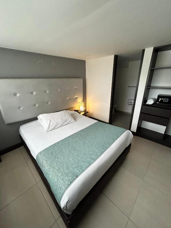 Postel nebo postele na pokoji v ubytování Aw Hotel Serenity Ferial