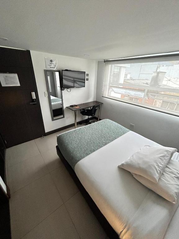 Postel nebo postele na pokoji v ubytování Aw Hotel Serenity Ferial