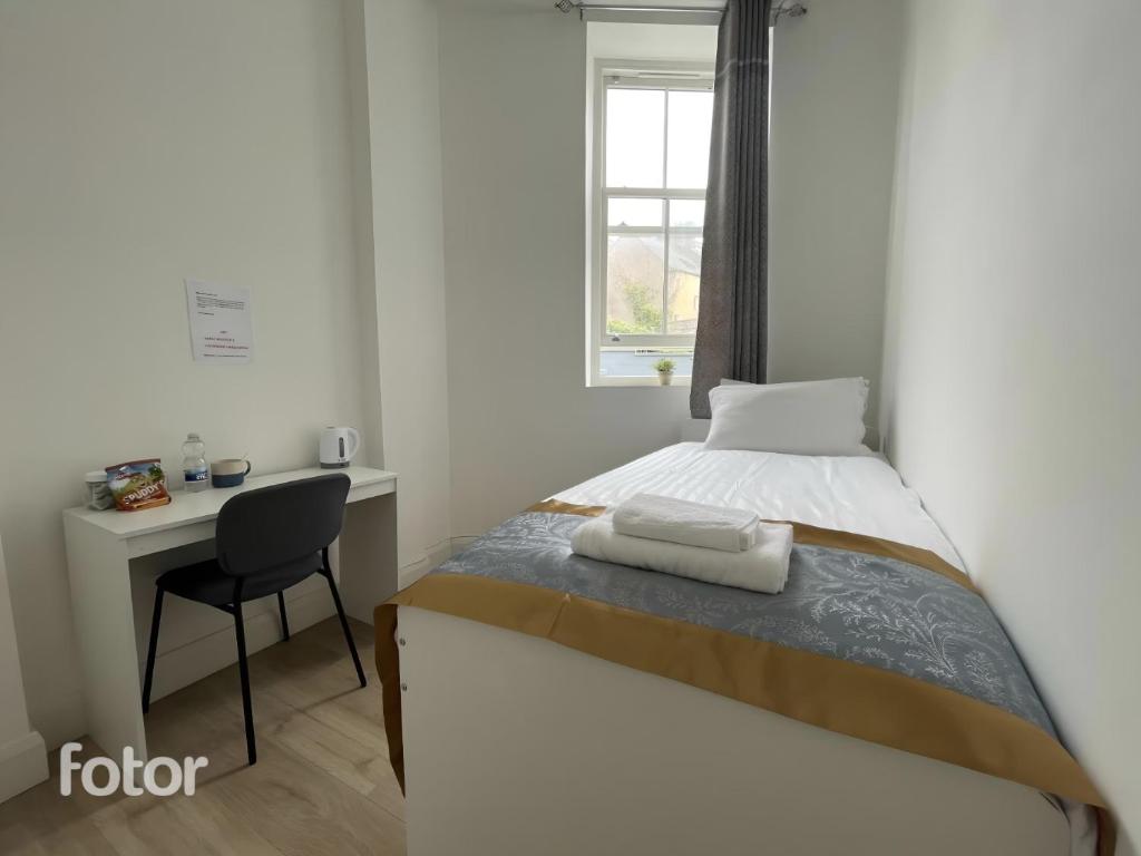 Postel nebo postele na pokoji v ubytování Leitrim Property Cork