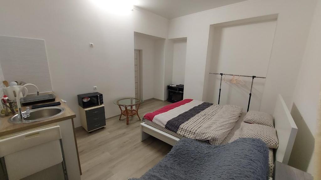 Postel nebo postele na pokoji v ubytování Apart 26