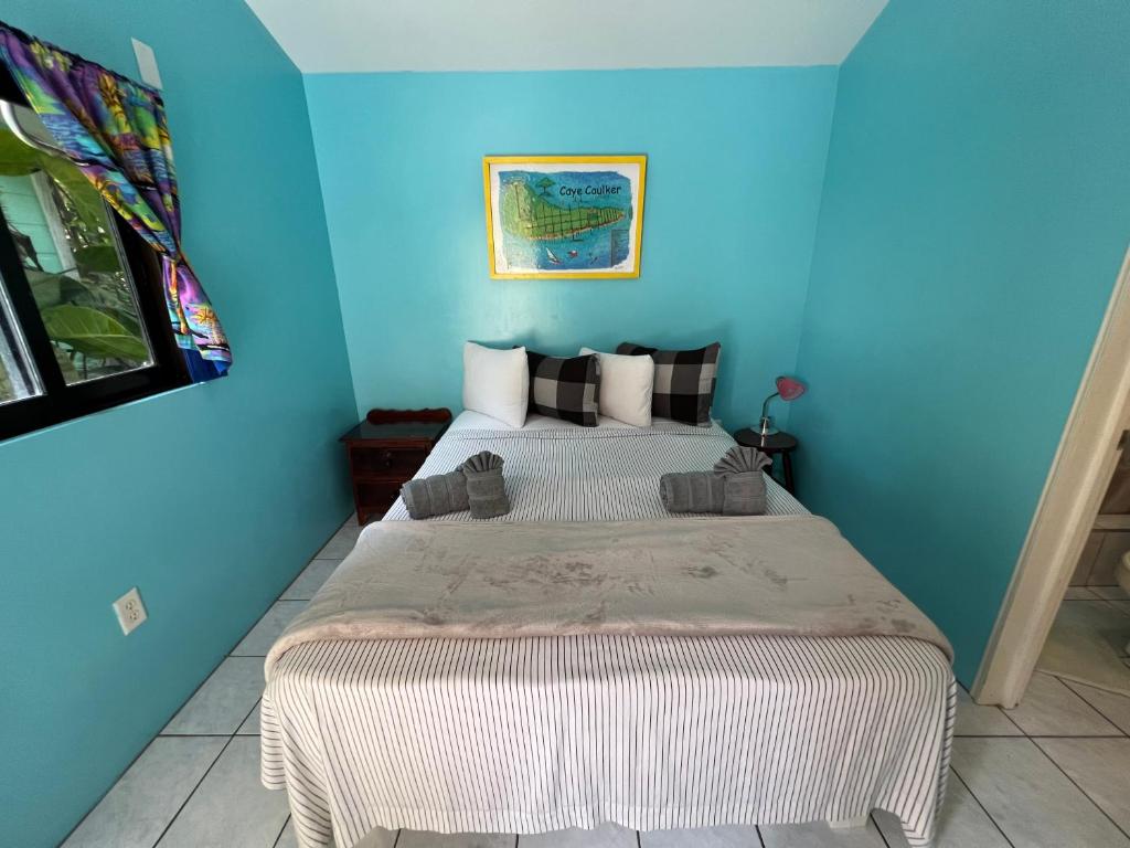 Cama o camas de una habitación en Barefoot Beach Belize