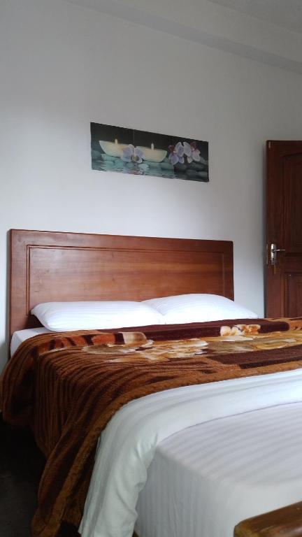 Postel nebo postele na pokoji v ubytování Lassana Villa