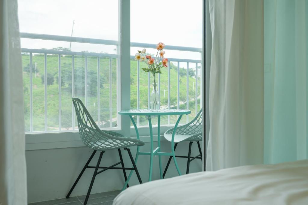 Postel nebo postele na pokoji v ubytování Firstcity Hotel YEOSU