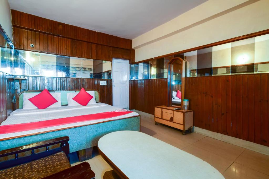 Postel nebo postele na pokoji v ubytování Hotel O Unique